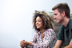 Two young colleagues in a meeting