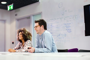Colleagues listening in a meeting