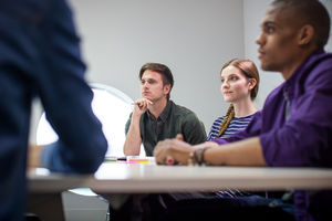 Colleagues listening in a meeting