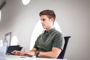 Businessman typing on a keyboard