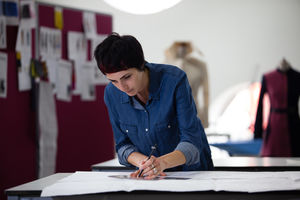 Fashion designer working on a pattern