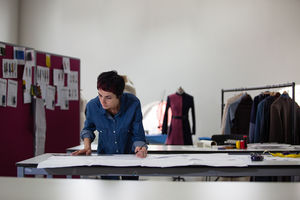 Fashion designer working on a pattern