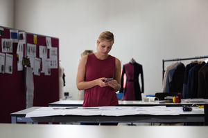 Fashion designer on a smartphone