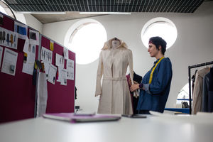 Fashion designer working on a garment