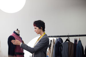 Fashion designer working on a garment