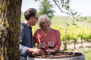 Senior couple visiting a vineyard