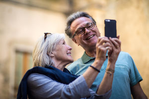 Senior couple on vacation taking a selfie