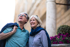 Senior couple on vacation visiting landmark