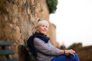 Senior woman relaxing on a bench