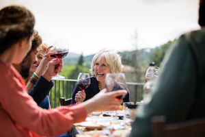 Senior woman celebrating with family