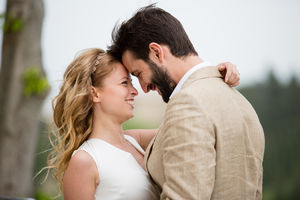 Bridge and Groom being romantic outdoors