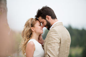 Bridge and Groom being romantic outdoors