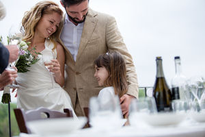 Bridge and Groom with Daughter on wedding day