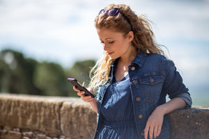 Young adult female using smartphone