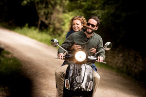Young couple on motorbike together