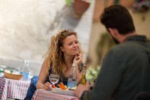 Young couple eating alfresco on vacation