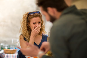 Young couple eating alfresco on vacation