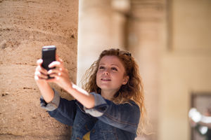 Tourist taking a photo of landmark