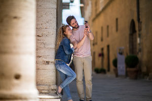 Tourists taking a photo of landmark