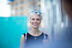 Young adult meeting a friend in city