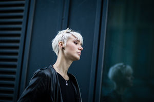 Young adult walking in urban city