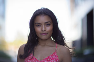 Portrait of young adult in city