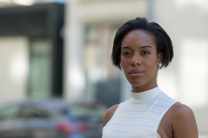 Businesswoman on way to work in city