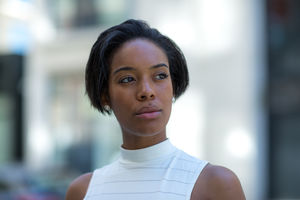 Businesswoman on way to work in city