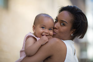 Mum and new baby outdoors
