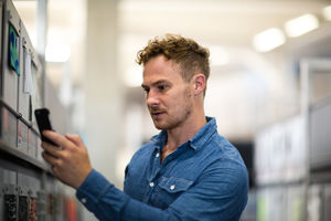 Designer taking photos of samples