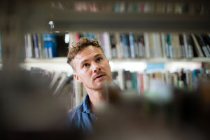 Adult student in library