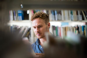 Adult student in library