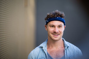 Young adult walking down street