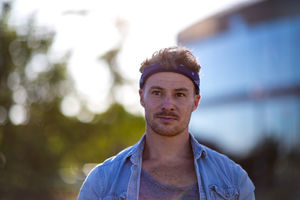 Young adult walking down street
