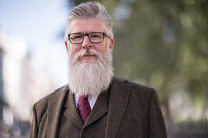 Portrait of fashionable senior male