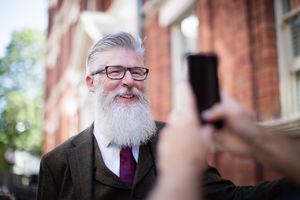 Trendy senior having his photo taken