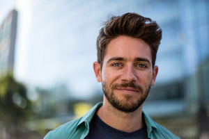 Portrait of young adult in modern city