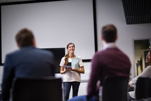 Female executive leading a  training conference