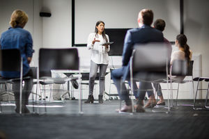 Female executive leading a  training conference