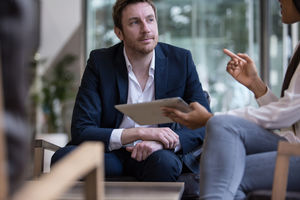 Businessman listening in a meeting