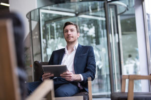 Businessman waiting in office reception
