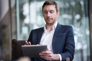 Businessman using digital tablet