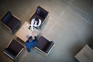 Overhead shot of handshake in a meeting