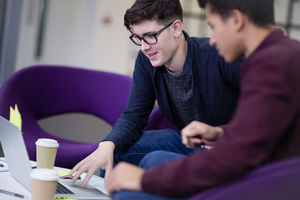 Male students working together