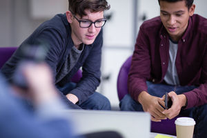 Male students working together
