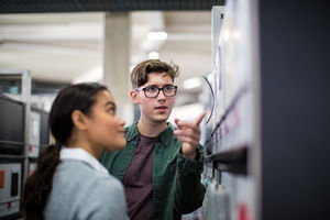 Students looking at an exhibition