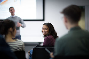 Smiling student at a lecture