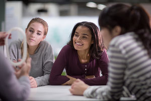 Students looking at a 3D model