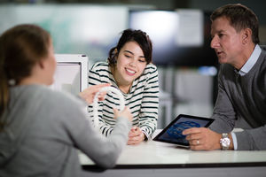 Students looking at a 3D model