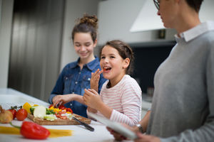 Family cooking a meal together